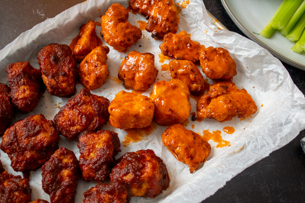 Chicken Bites Coated in BBQ and Buffalo Sauce